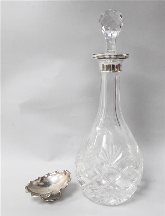 A modern silver mounted cut glass decanter and Chinese Export silver nut dish by Wang Hing.